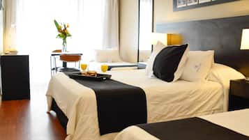 Standard Quadruple Room | In-room safe, laptop workspace, blackout curtains, iron/ironing board