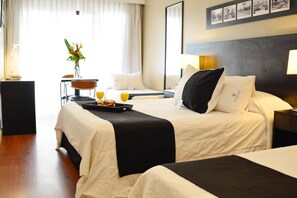 Standard Quadruple Room | In-room safe, laptop workspace, blackout curtains, iron/ironing board - Pocitos Plaza Hotel (Montevideo)