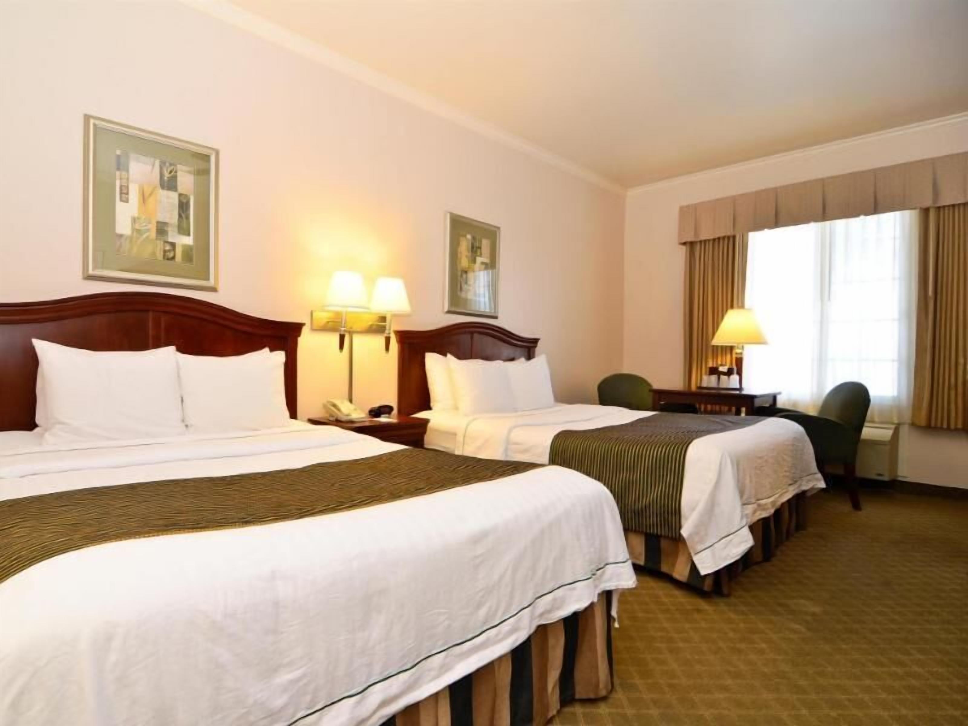 Minibar, in-room safe, iron/ironing board, free cribs/infant beds