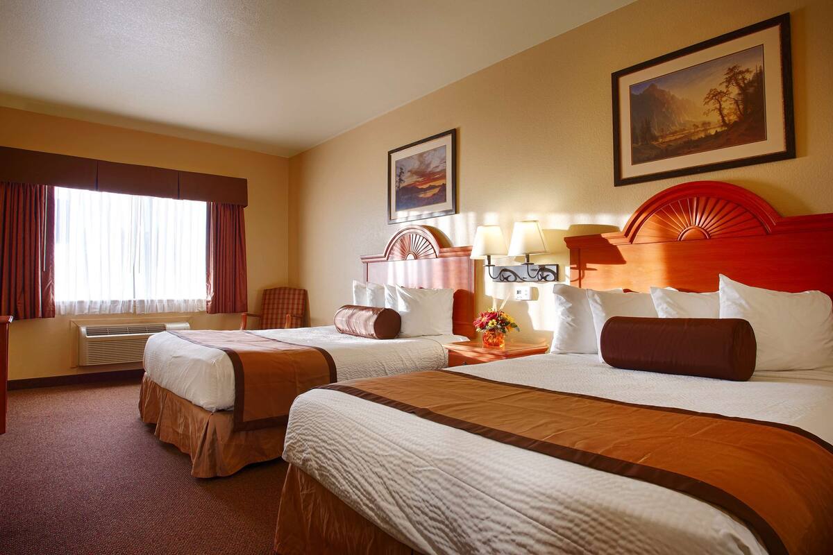 desk, laptop workspace, iron/ironing board, free rollaway beds