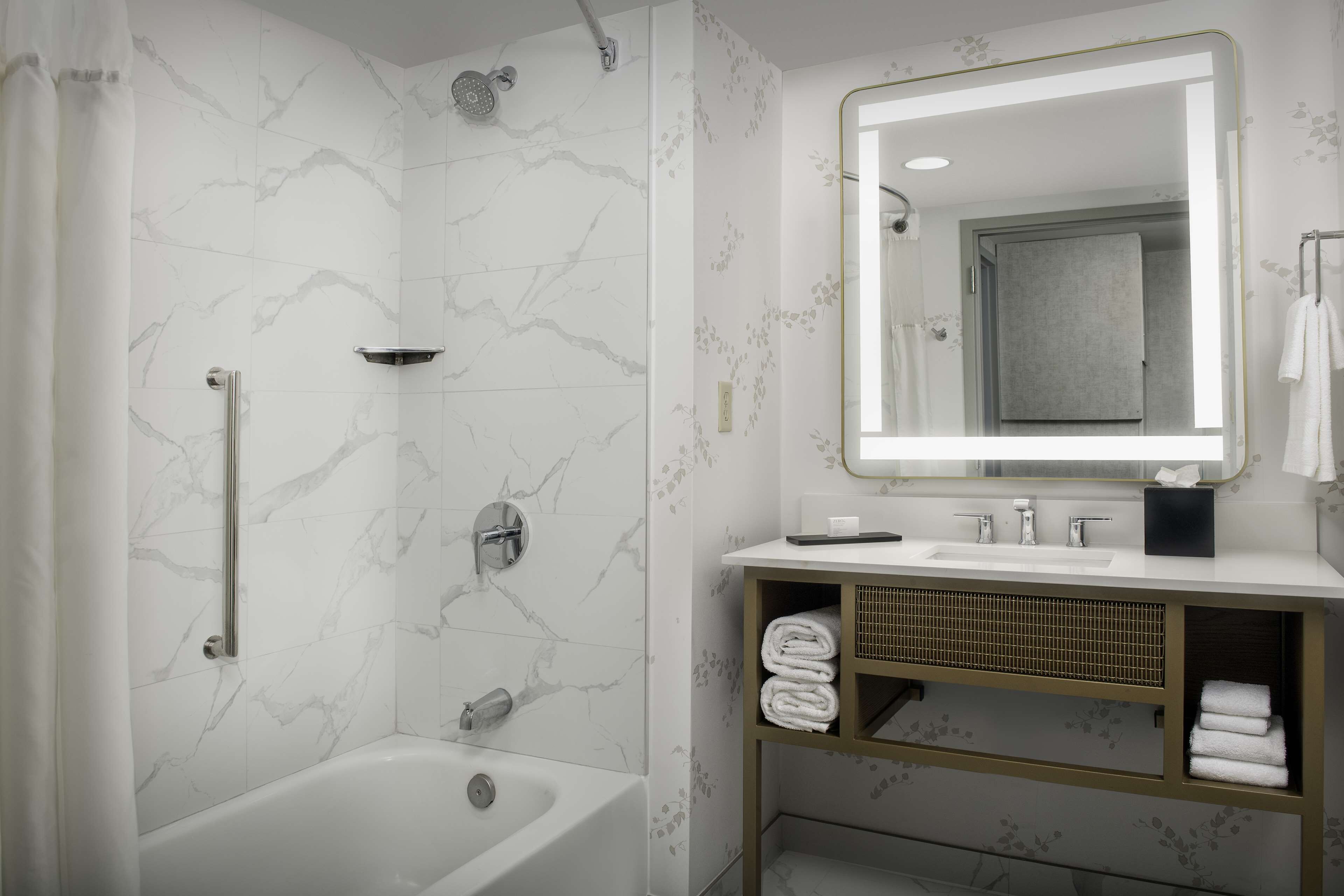 combined shower/bathtub, free toiletries, hair dryer, towels