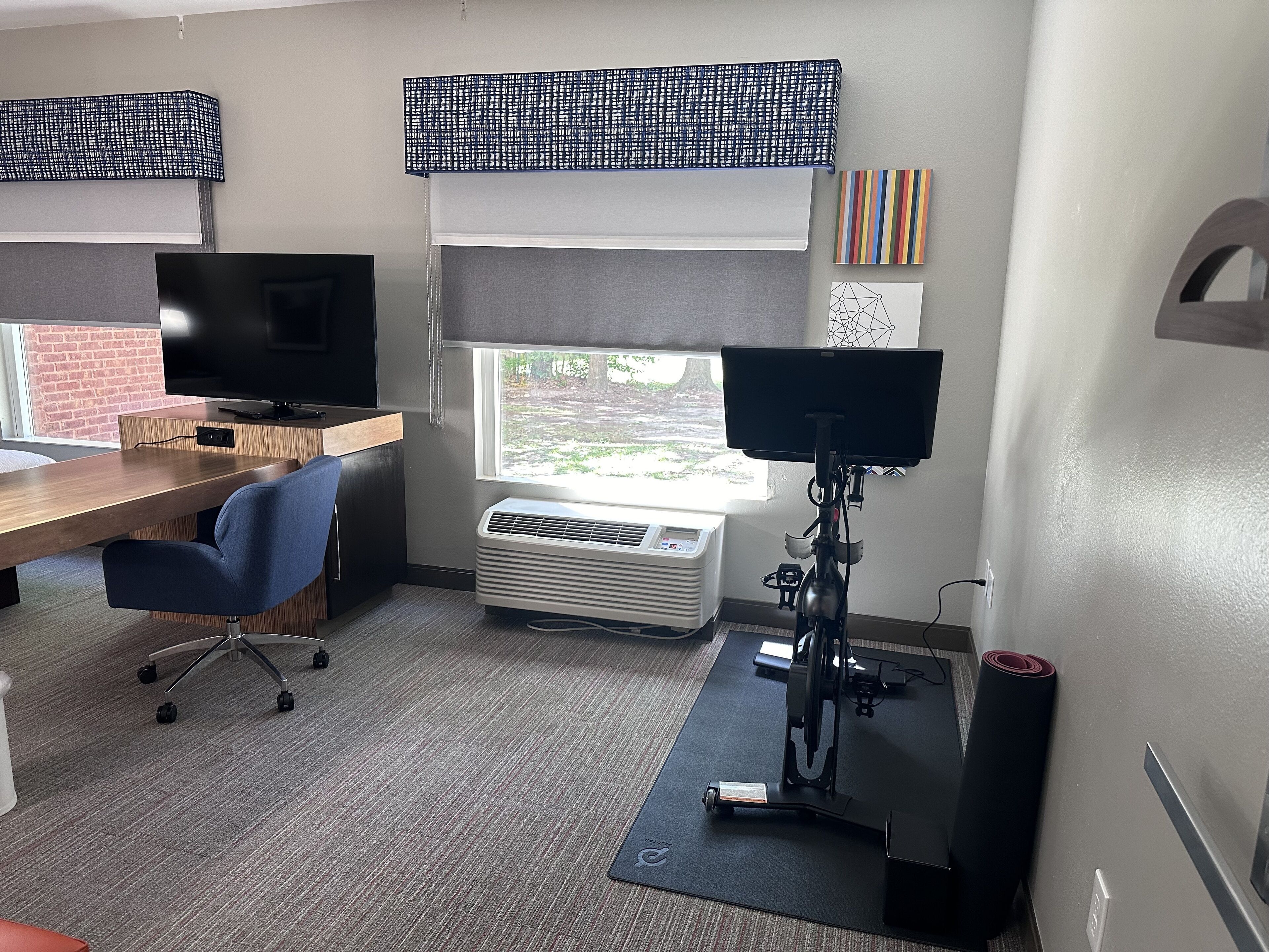 room, 1 king bed (peloton bike) | in-room safe, desk, iron/ironing board, free cots/infant beds