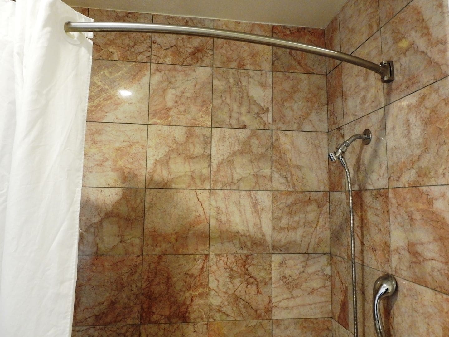 combined shower/bathtub, free toiletries, hair dryer, towels