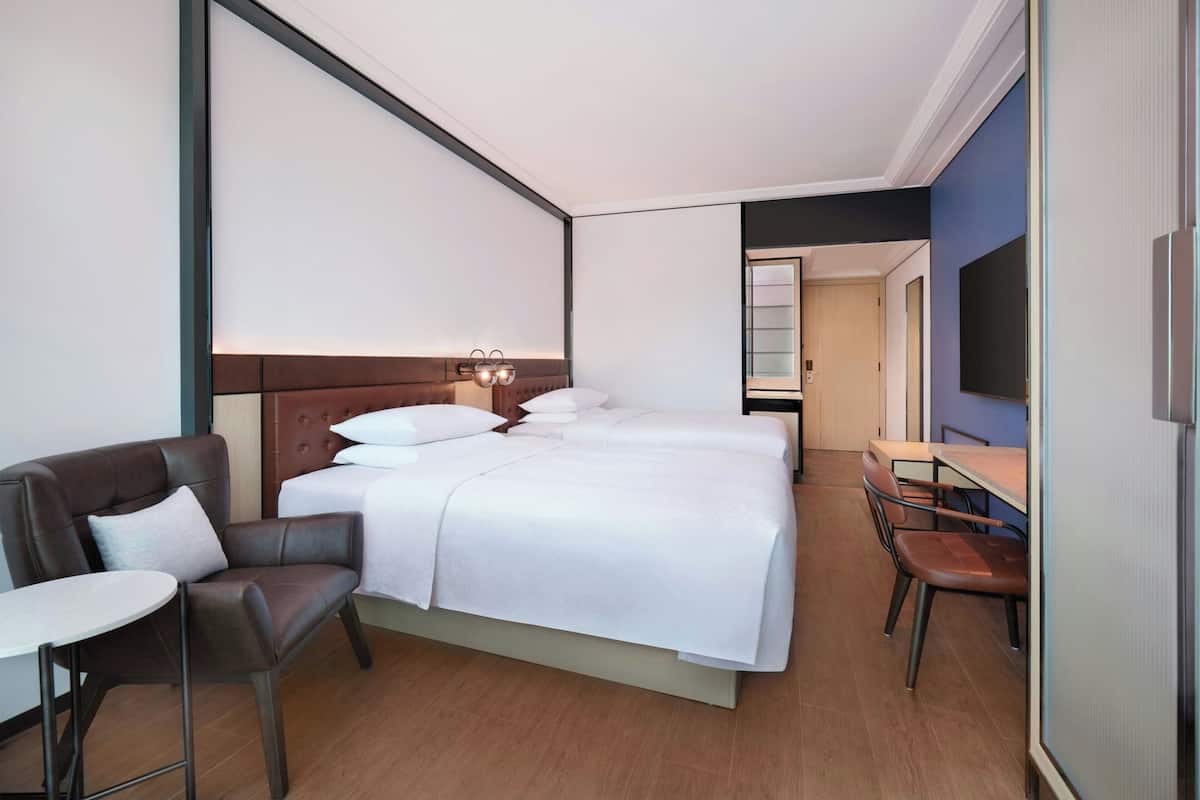 Premium Room, 2 Double Beds | In-room safe, desk, laptop workspace, blackout drapes