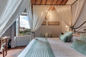 Quadruple Room | Premium bedding, down comforters, in-room safe, individually furnished -  Hotel Palazzo del Capitano Wellness & Relais - Luxury Borgo Capitano Collection (San Quirico d'Orcia)