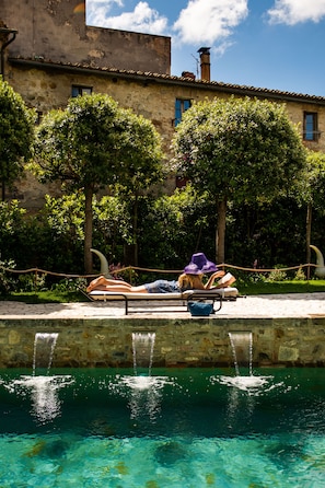 Seasonal outdoor pool, pool umbrellas, pool loungers