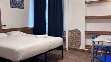 Deluxe tweepersoonskamer | 1 slaapkamer, verduisterende gordijnen, een strijkplank/strijkijzer