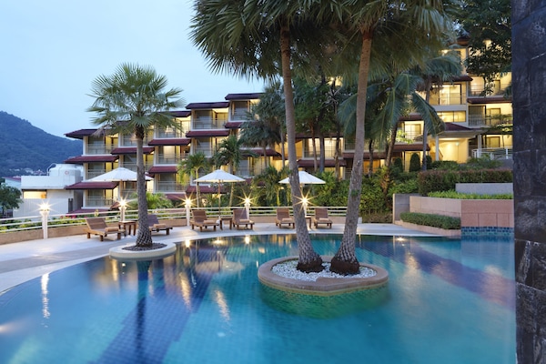 2 outdoor pools, open 8:00 AM to 9:00 PM, pool loungers
