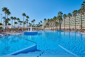 Indoor pool, outdoor pool, pool umbrellas, sun loungers