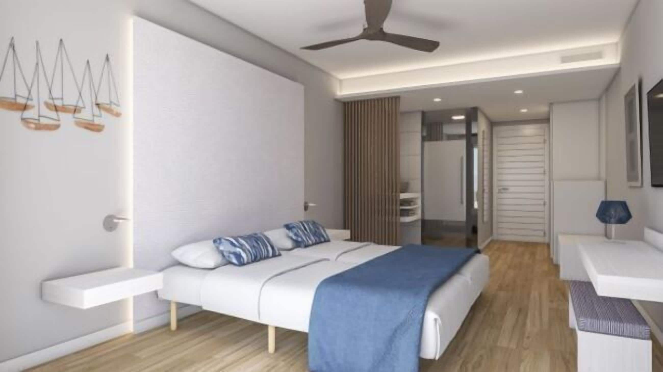 Une chambre à coucher moderne, avec un lit, une table de chevet et un ventilateur de plafond.
