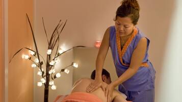 Experience a serene massage therapy session in a peaceful, tranquil space.