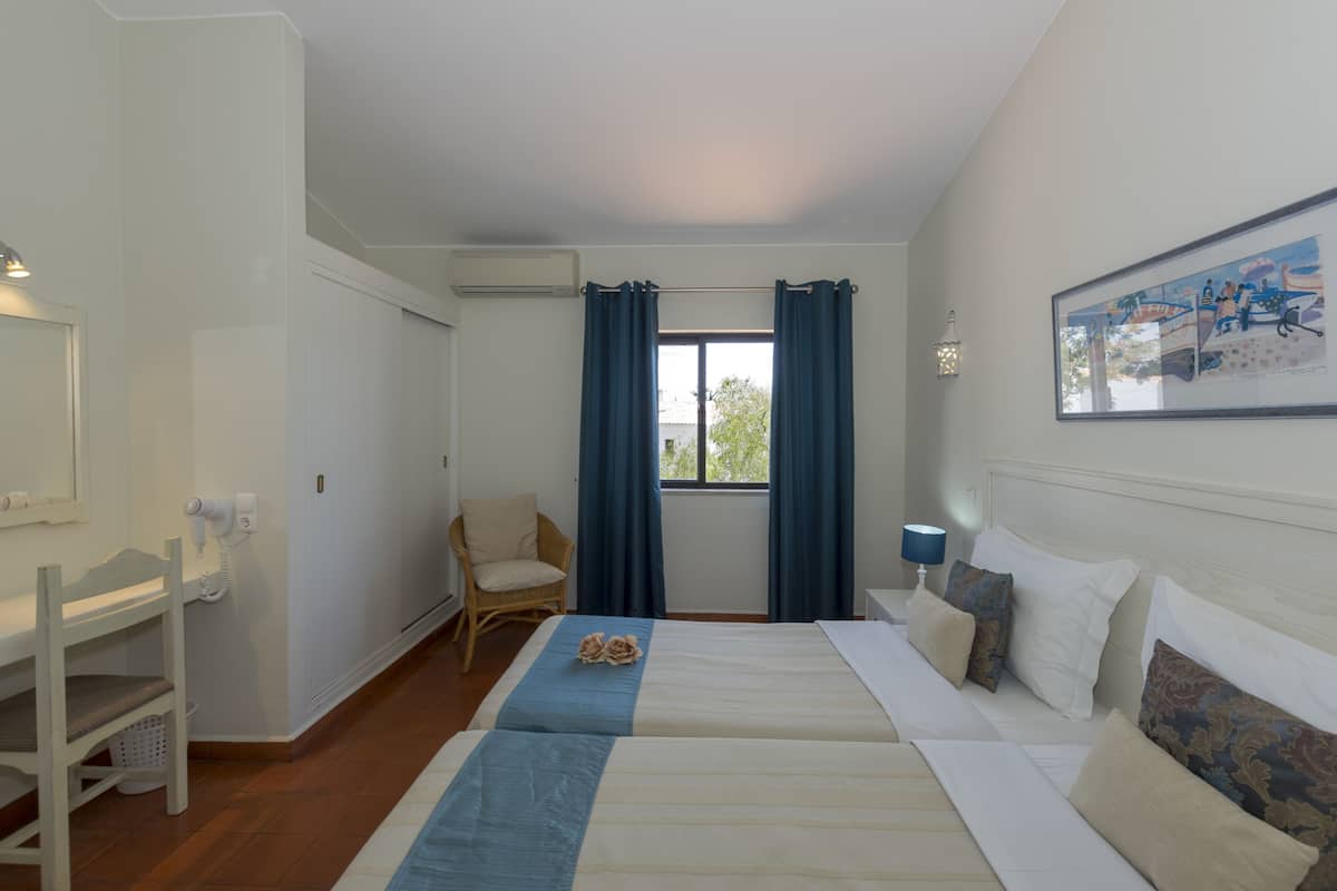 Iron/ironing board, cribs (free), WiFi (free), individually decorated