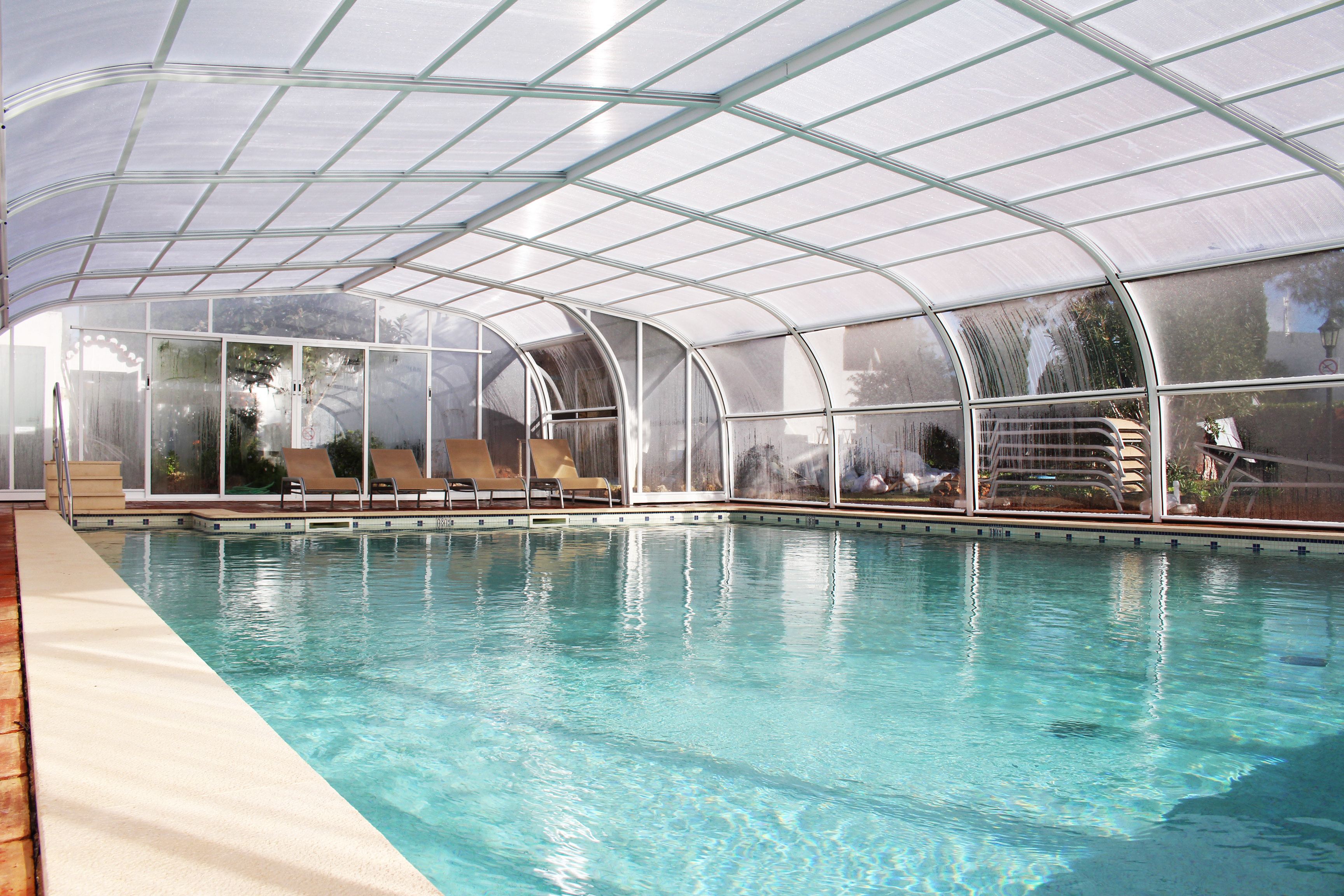3 outdoor pools, pool umbrellas, pool loungers