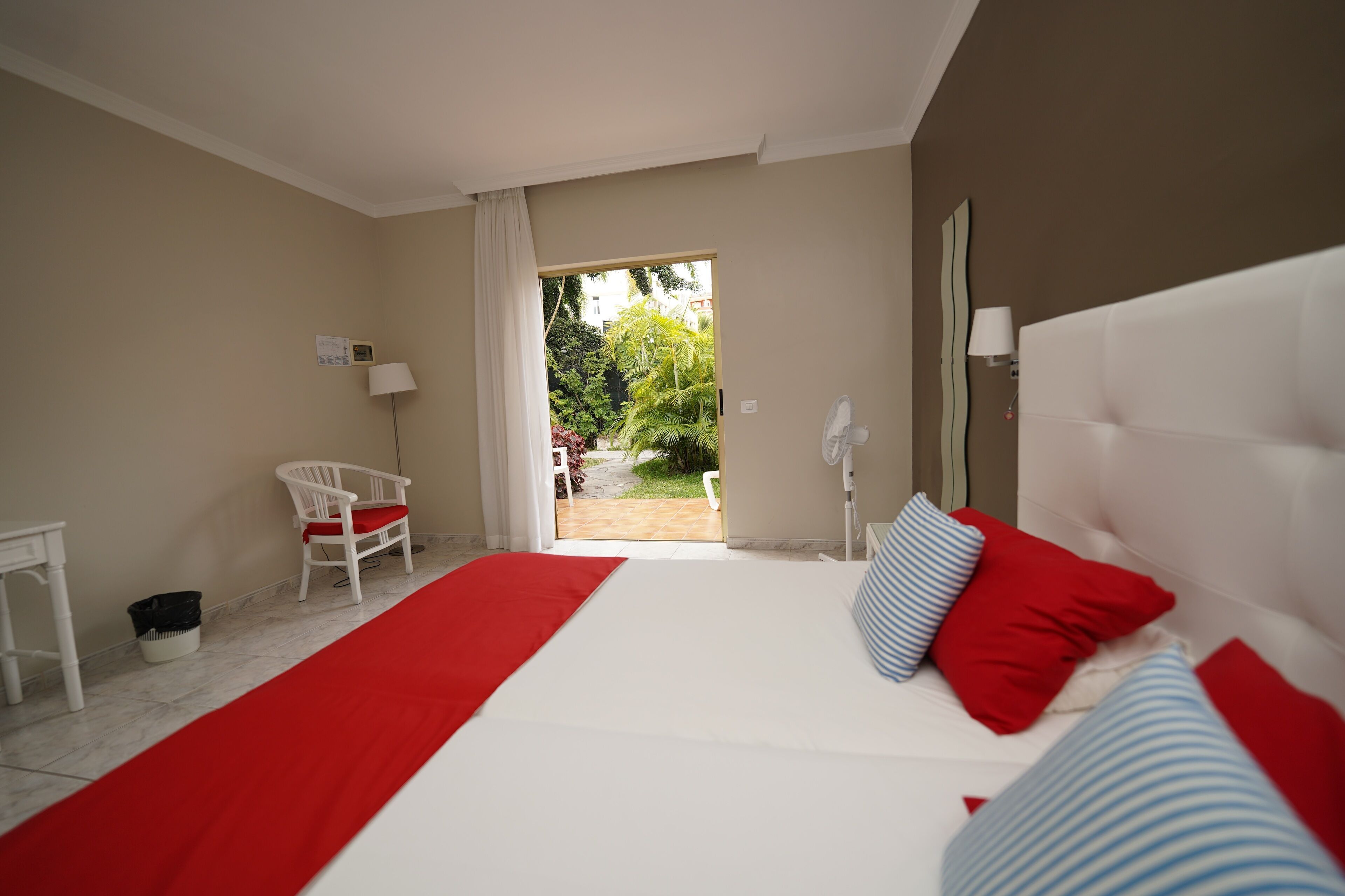 standard double room, garden view | in-room safe, free wifi, bed sheets