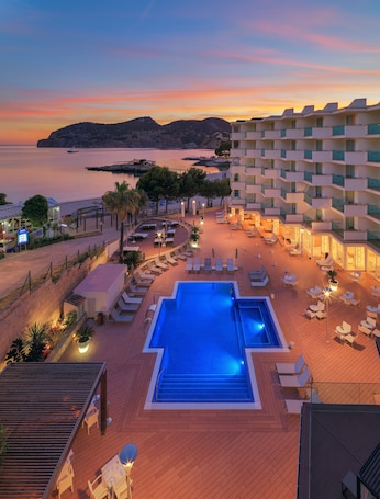 Indoor pool, outdoor pool, pool umbrellas, sun loungers