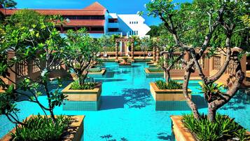 Outdoor pool, open 7:00 AM to 10:00 PM, pool umbrellas, sun loungers