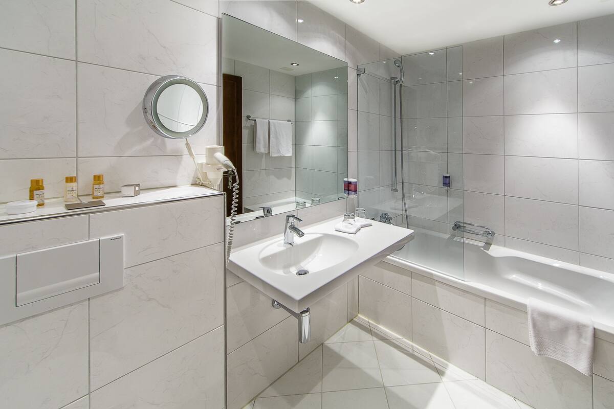 deep-soaking bathtub, free toiletries, hair dryer, bathrobes