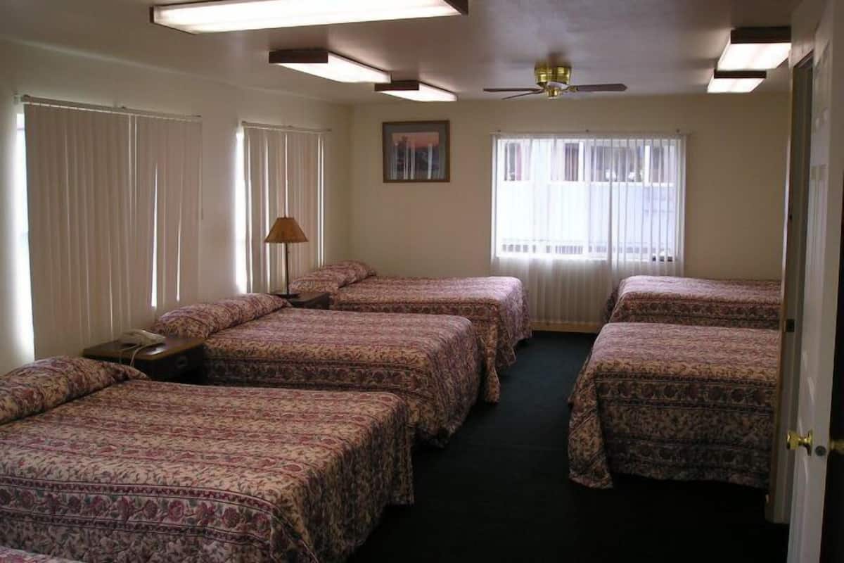 Individually furnished, desk, laptop workspace, rollaway beds
