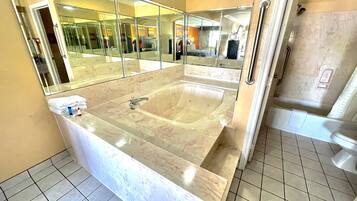 Standard Suite, 1 King Bed, Non Smoking, Jetted Tub | Desk, iron/ironing board, free WiFi, bed sheets