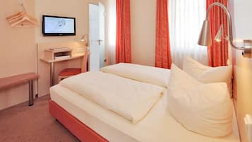 Hypo-allergenic bedding, desk, blackout drapes, soundproofing