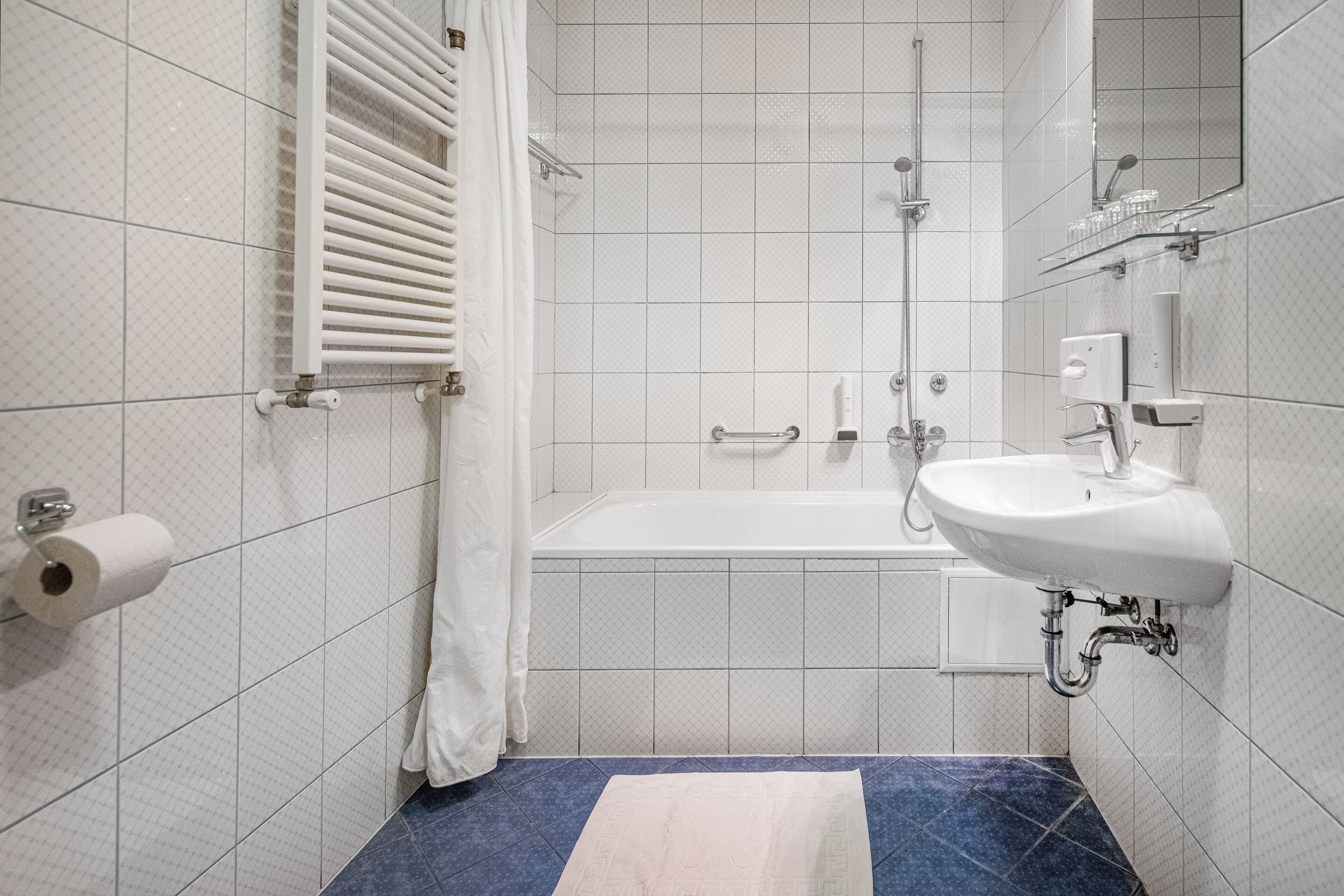 family room | bathroom | hair dryer, towels, soap, toilet paper