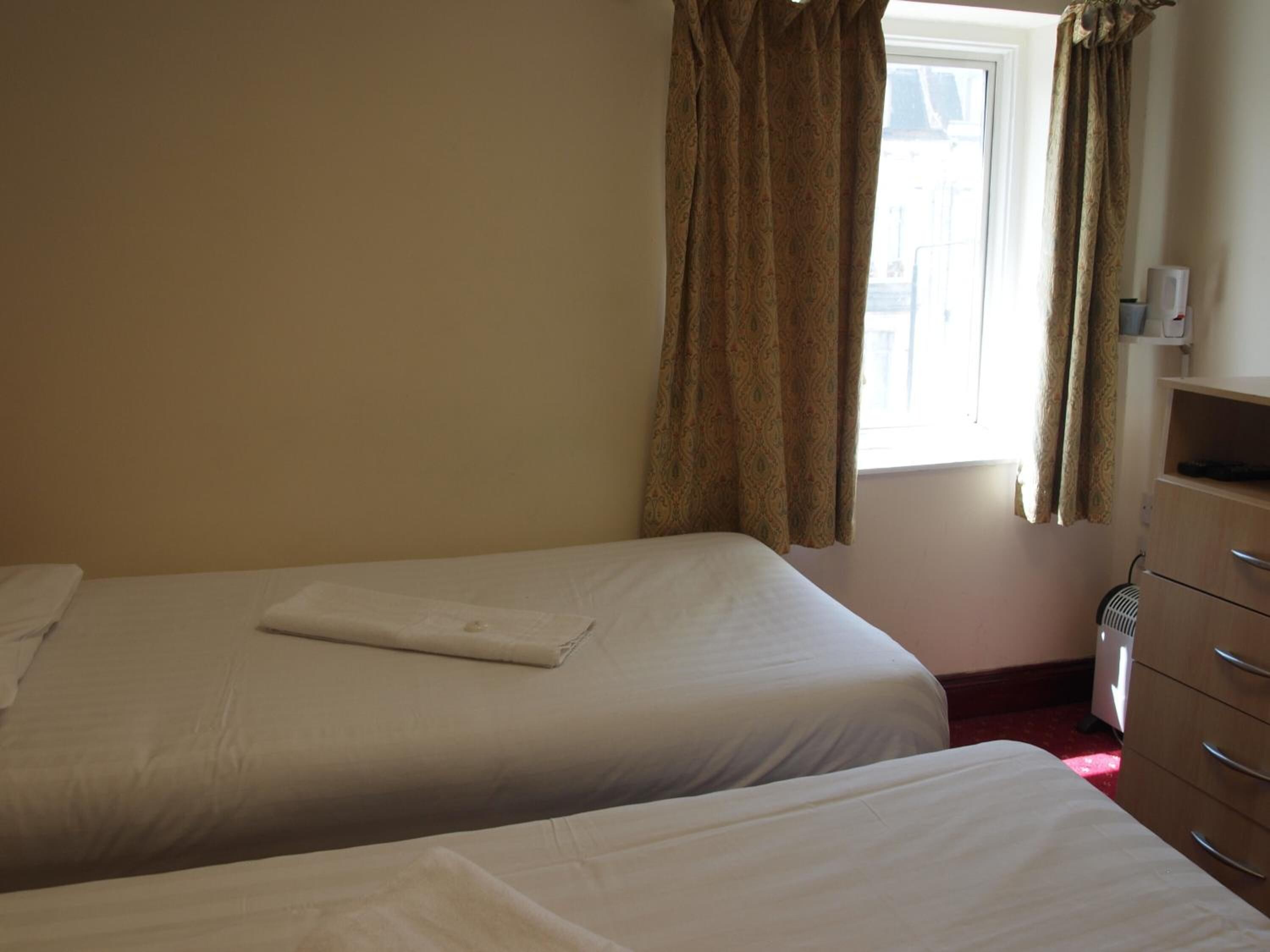 Foto - Olympia Inn Hotel