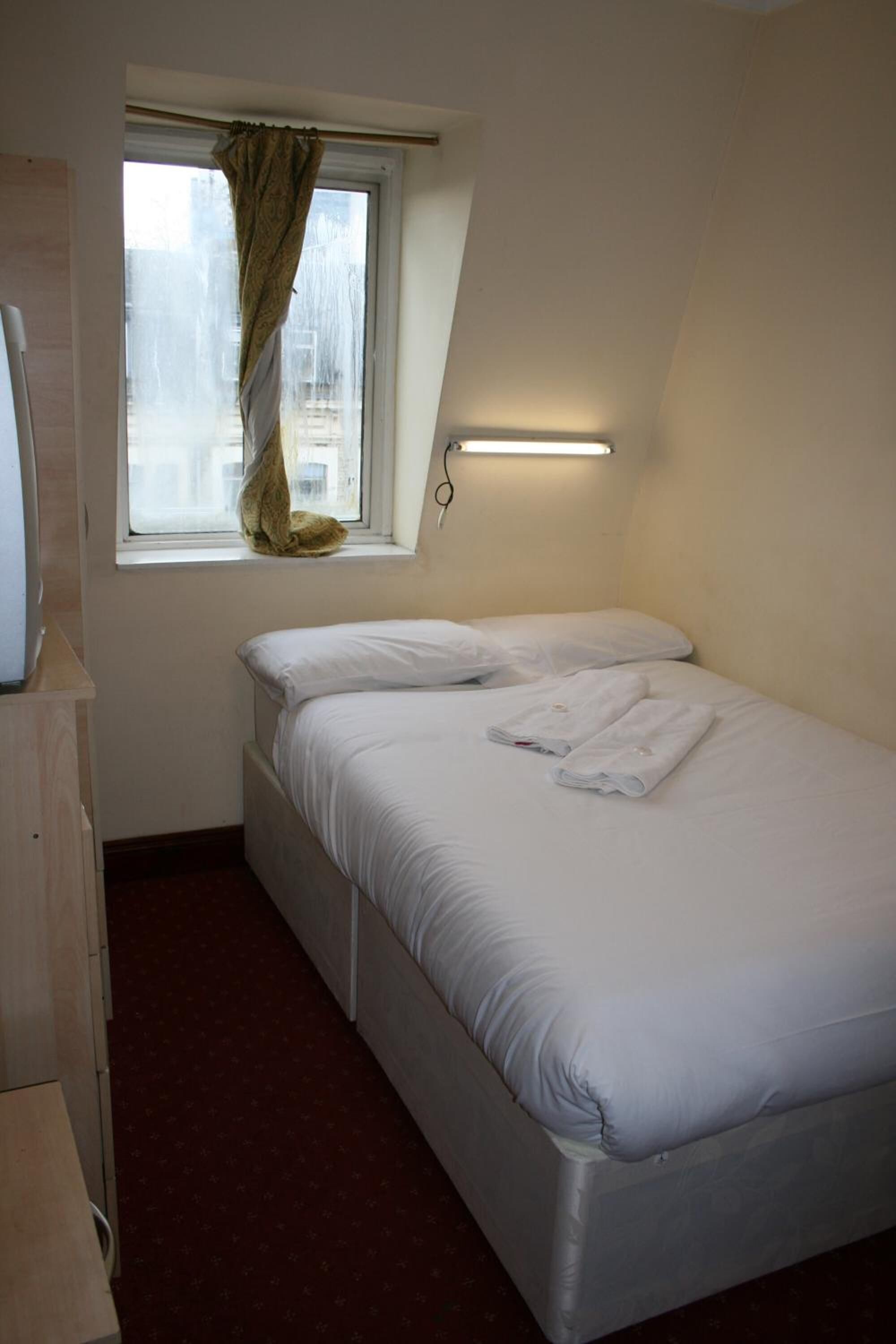 Foto - Olympia Inn Hotel