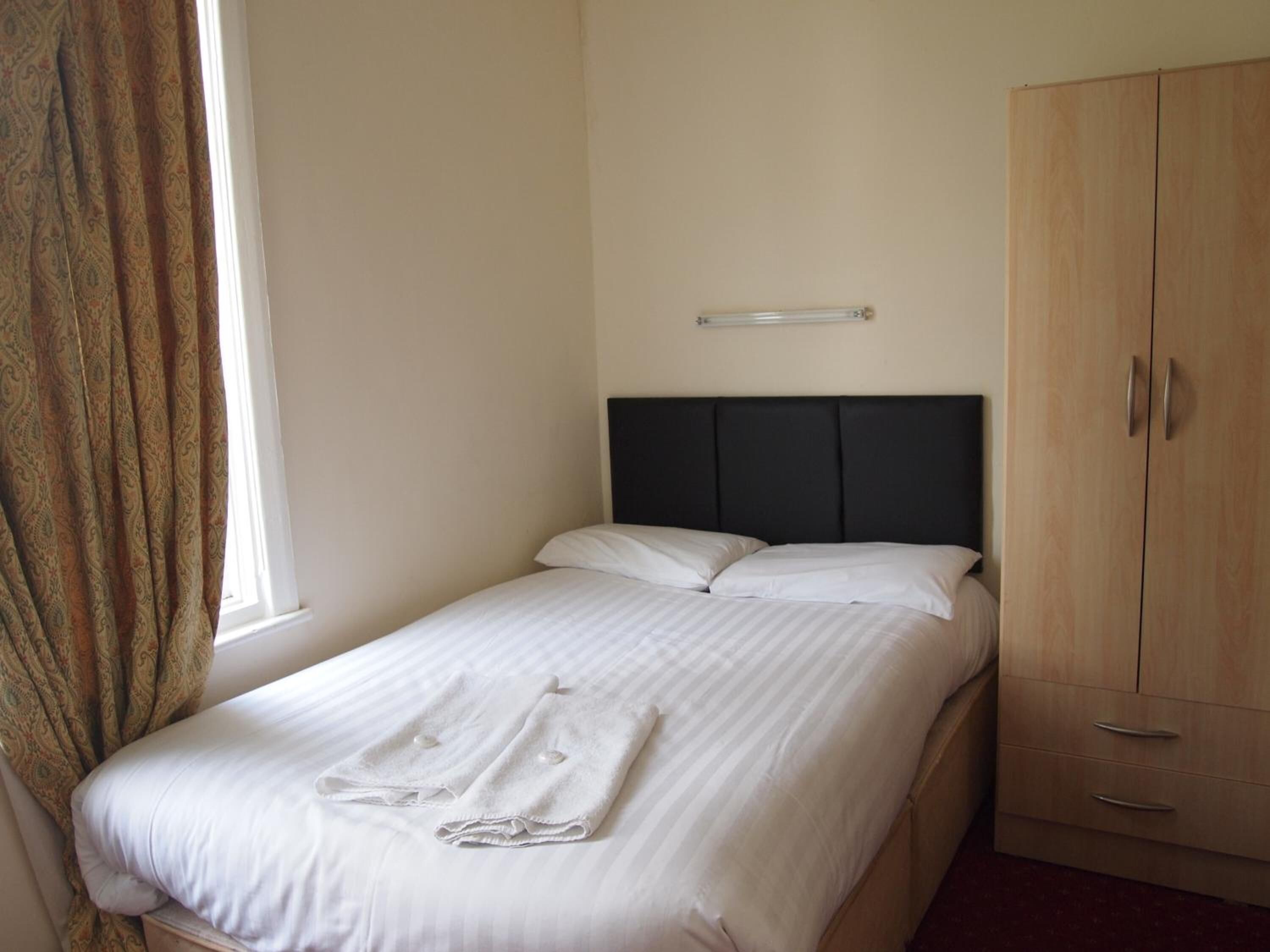 Foto - Olympia Inn Hotel