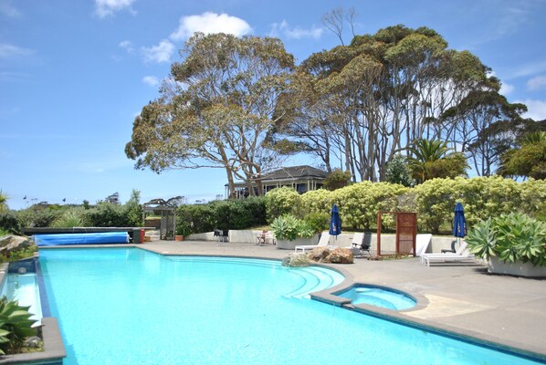 Outdoor pool, pool umbrellas, pool loungers