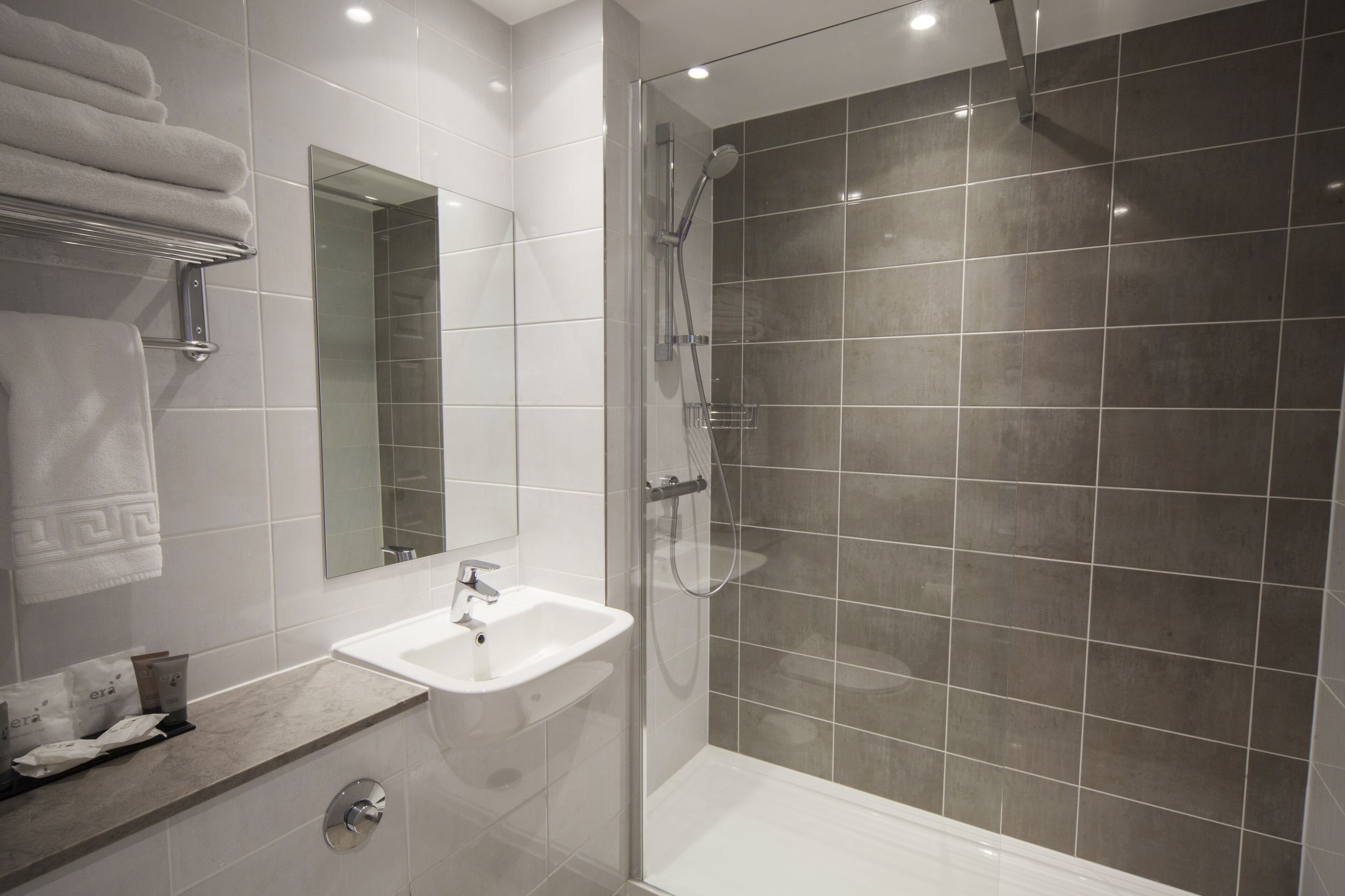 family room / quad room | bathroom | combined shower/bathtub, hair dryer, towels