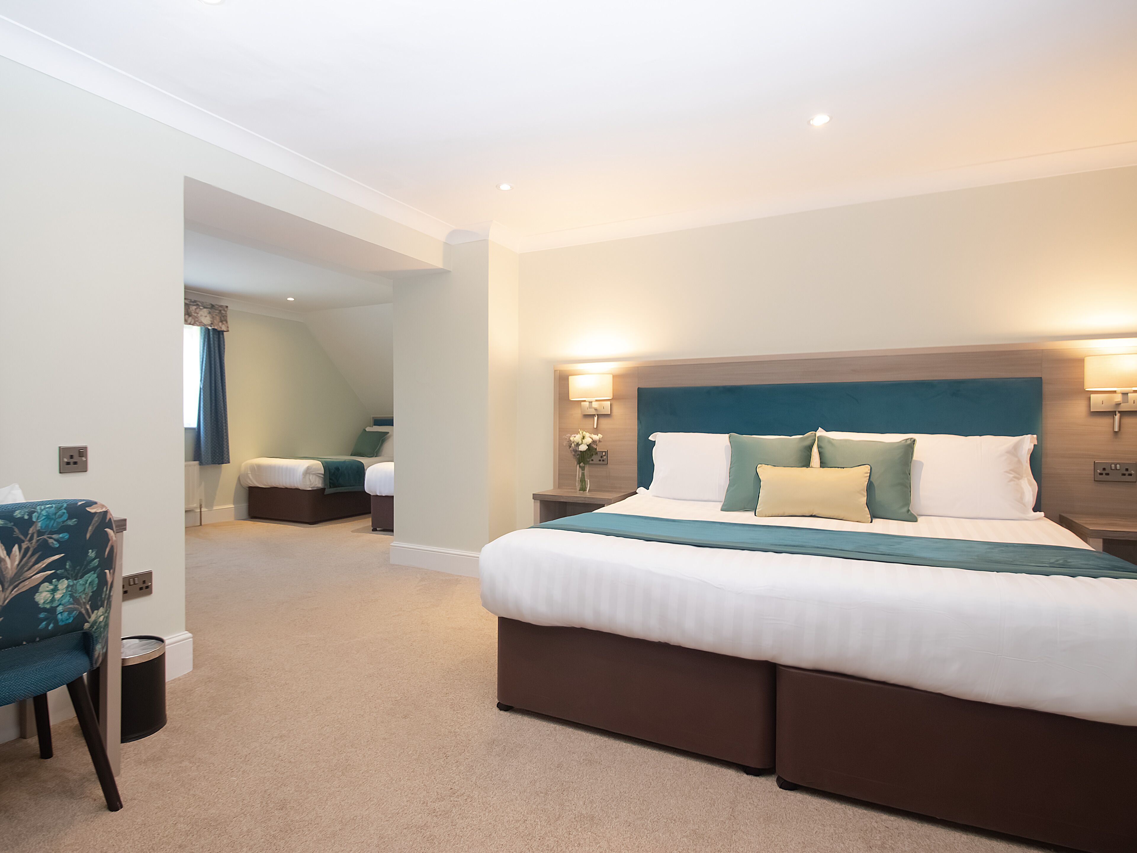 family room / quad room | in-room safe, individually decorated, individually furnished, desk