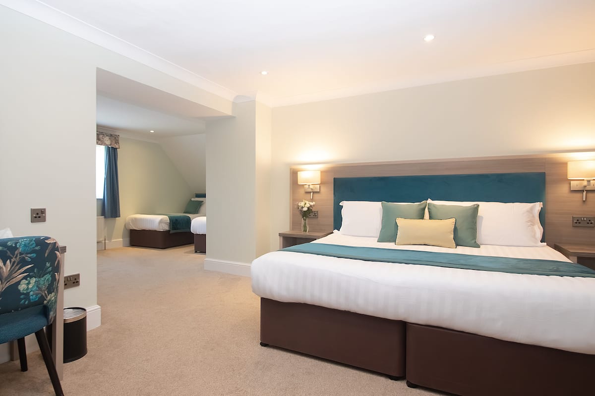 family room / quad room | in-room safe, individually decorated, individually furnished, desk