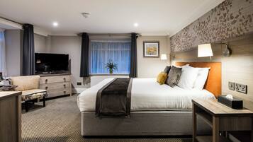 Deluxe tweepersoonskamer | Een kluis op de kamer, individueel gedecoreerd, individueel gemeubileerd