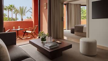 Luxe beddengoed, een minibar, een kluis op de kamer, een bureau