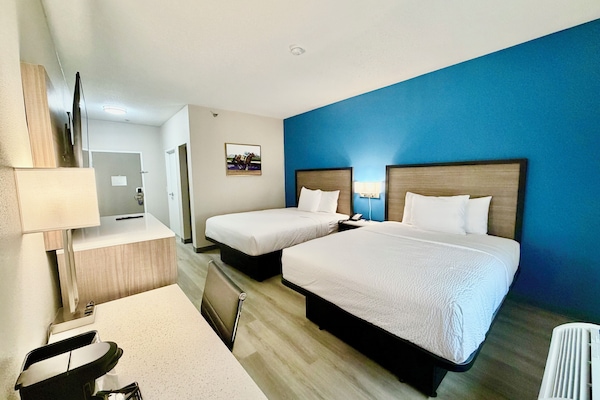Room, 2 Queen Beds, Non Smoking | In-room safe, desk, blackout drapes, iron/ironing board