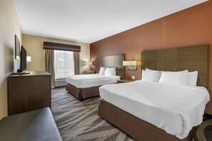 Premium bedding, desk, laptop workspace, blackout curtains