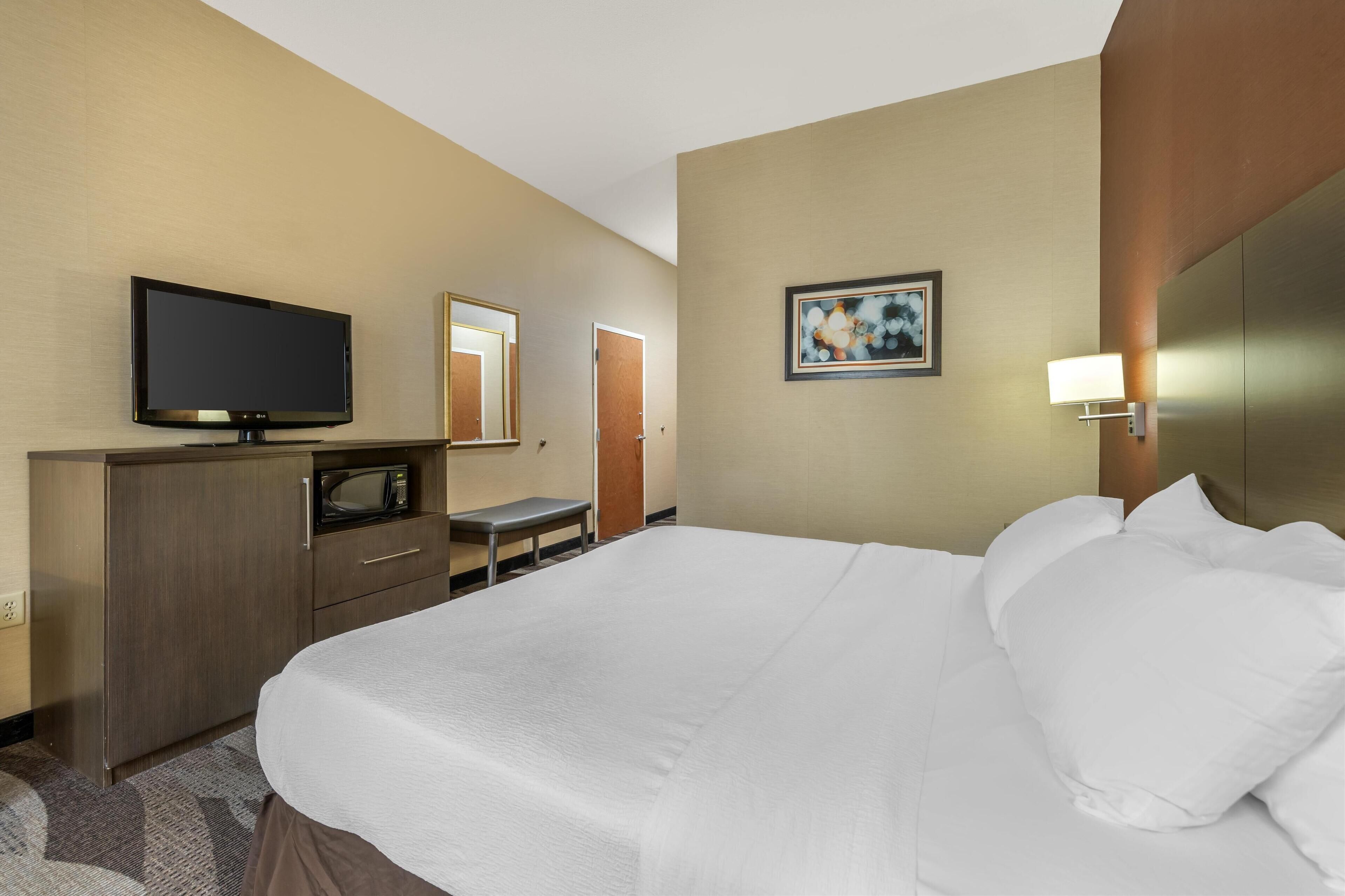 premium bedding, desk, laptop workspace, blackout curtains