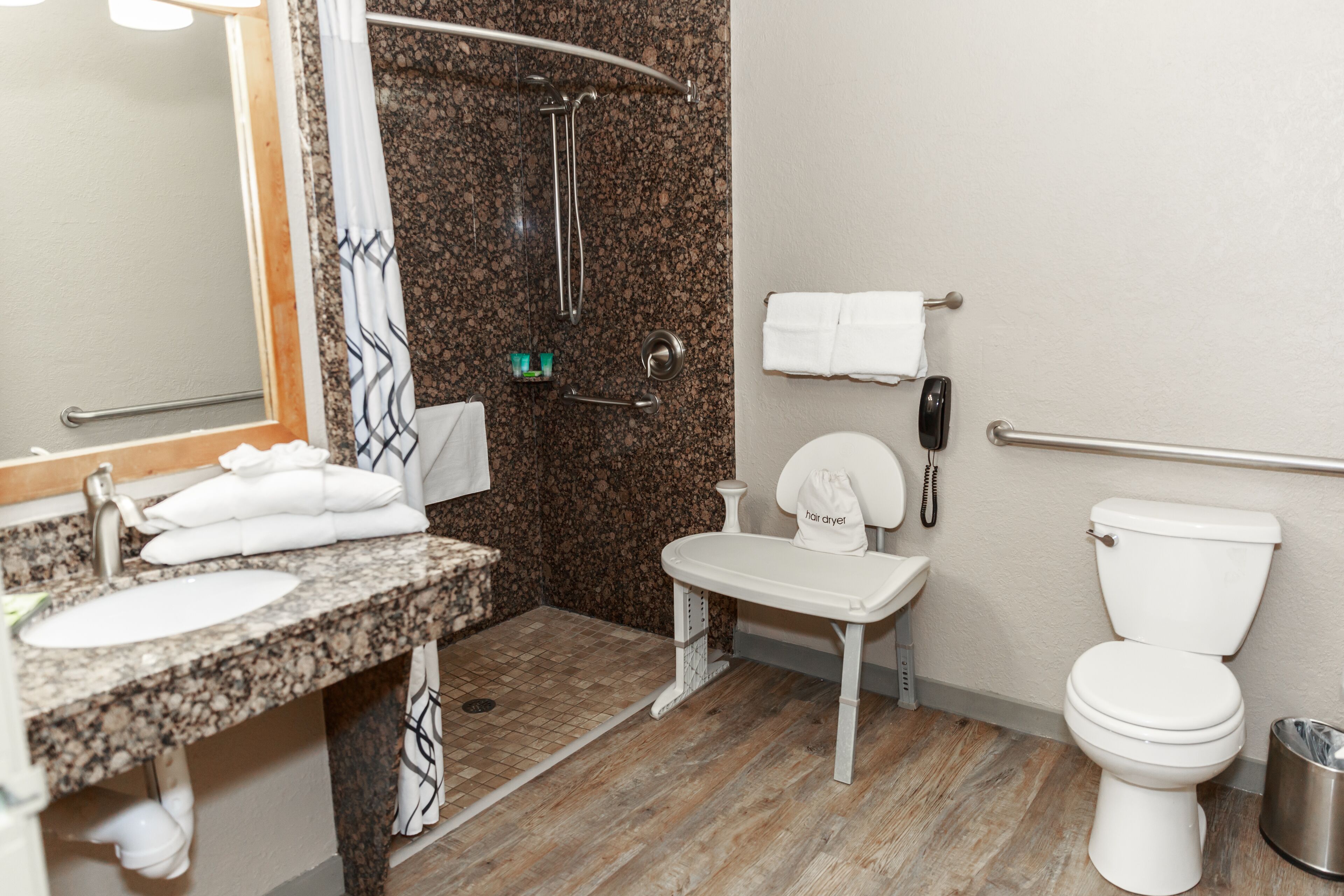 combined shower/bathtub, free toiletries, hair dryer, towels