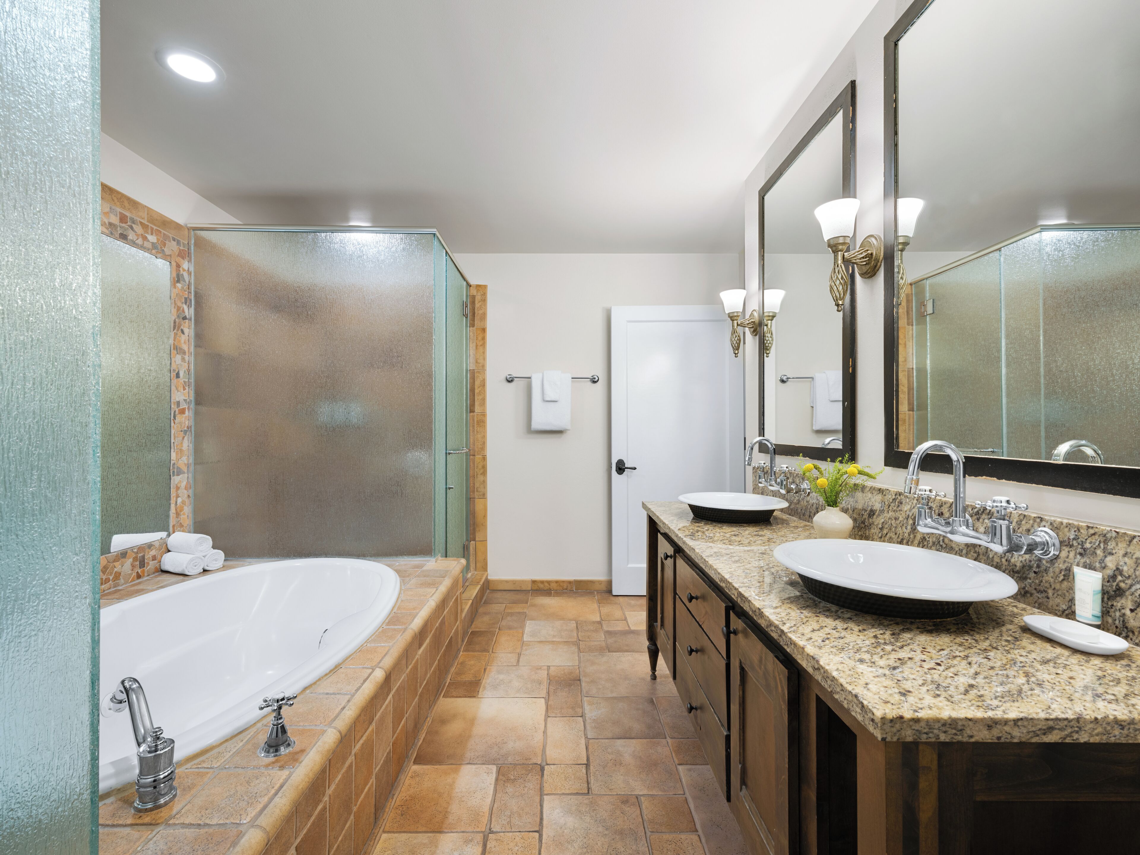 designer toiletries, hair dryer, towels, soap