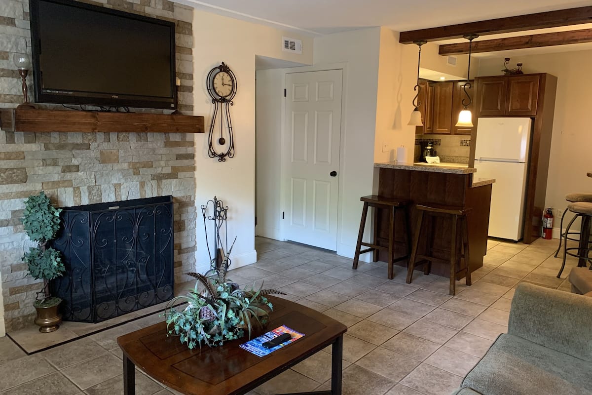 Condo, 2 Bedrooms (205) | Living area | TV, fireplace