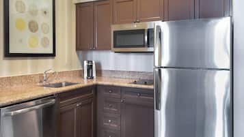 Full-sized fridge, microwave, stovetop, dishwasher