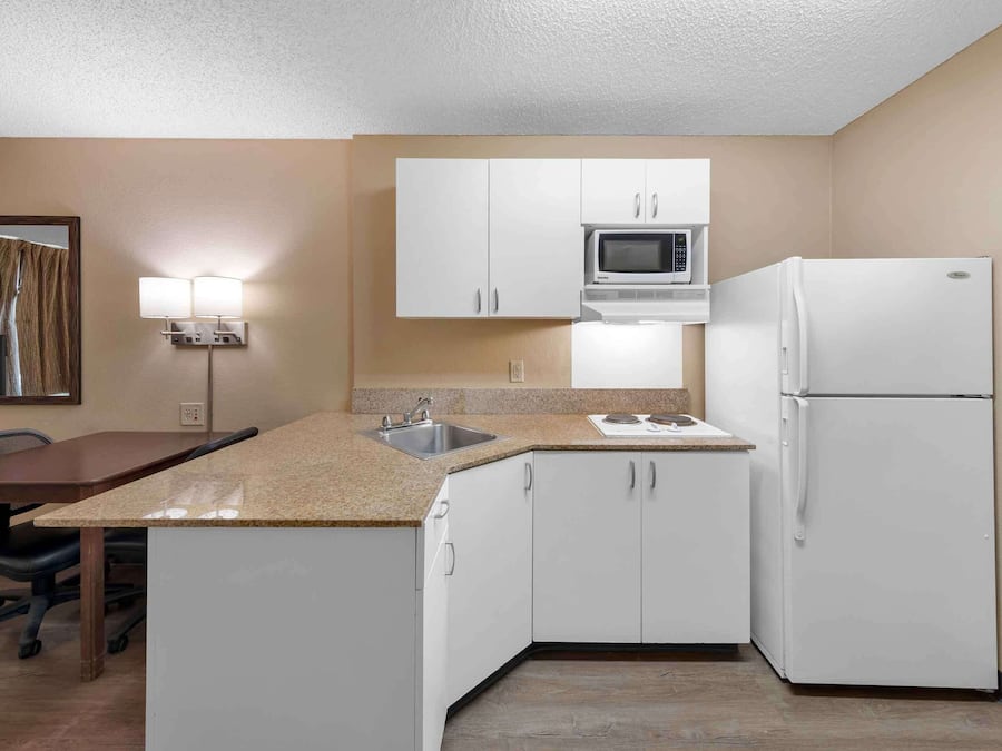 Fridge, microwave, stovetop, coffee/tea maker