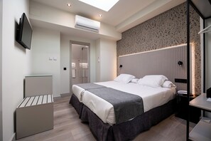 Minibar, coffres-forts dans les chambres, rideaux occultants