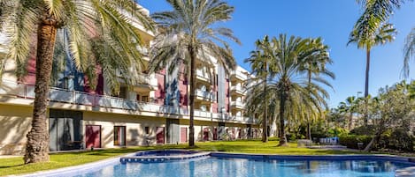 Outdoor pool, open 9:30 AM to 8:00 PM, pool umbrellas, sun loungers