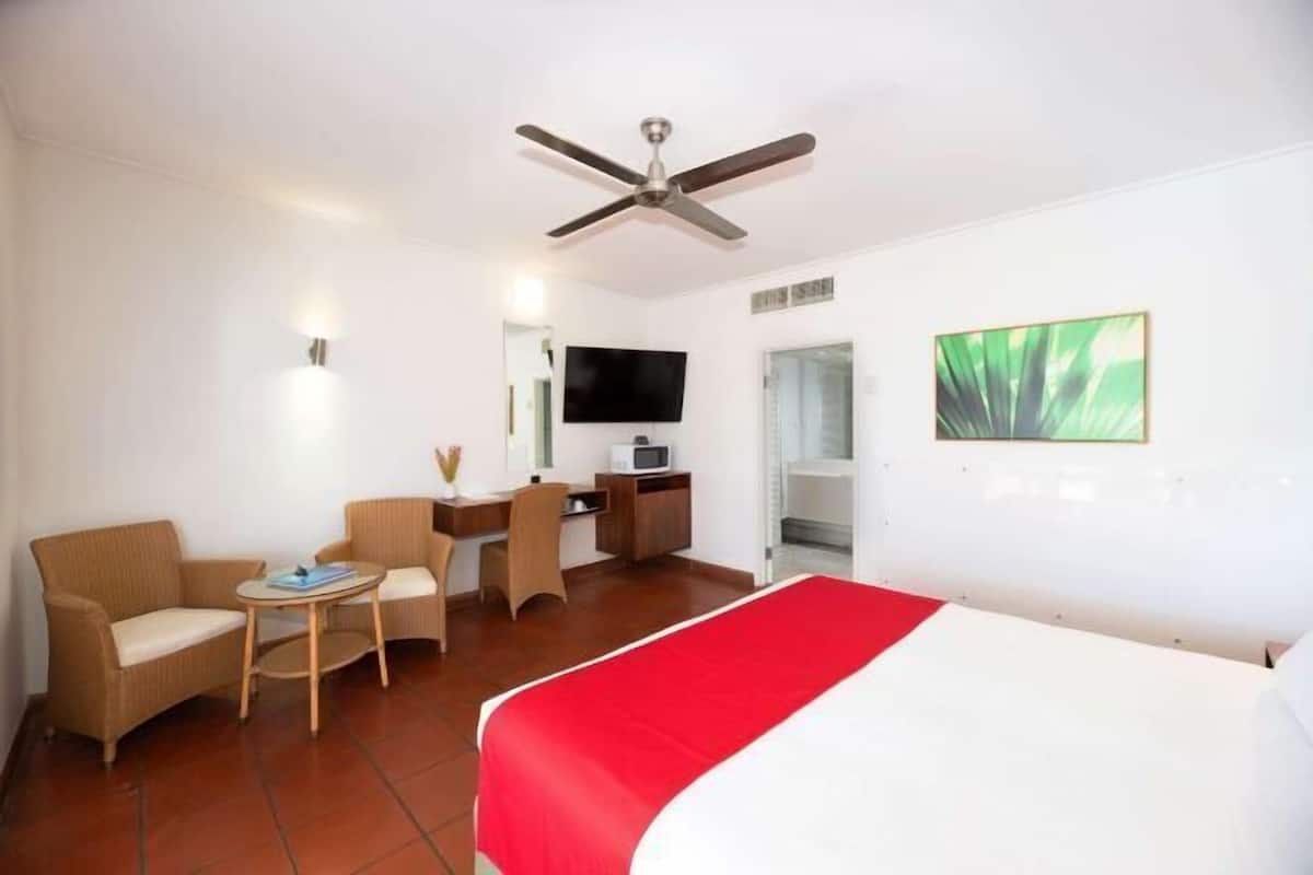 Premium bedding, desk, laptop workspace, soundproofing