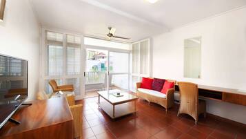 Premium bedding, desk, laptop workspace, soundproofing