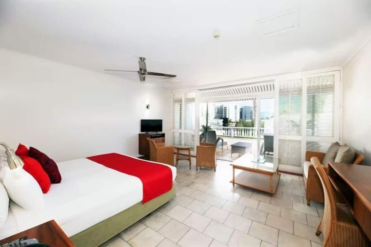 Premium bedding, desk, laptop workspace, soundproofing