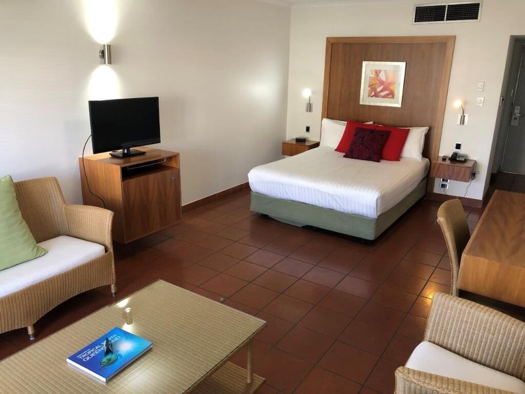 Premium bedding, desk, laptop workspace, soundproofing