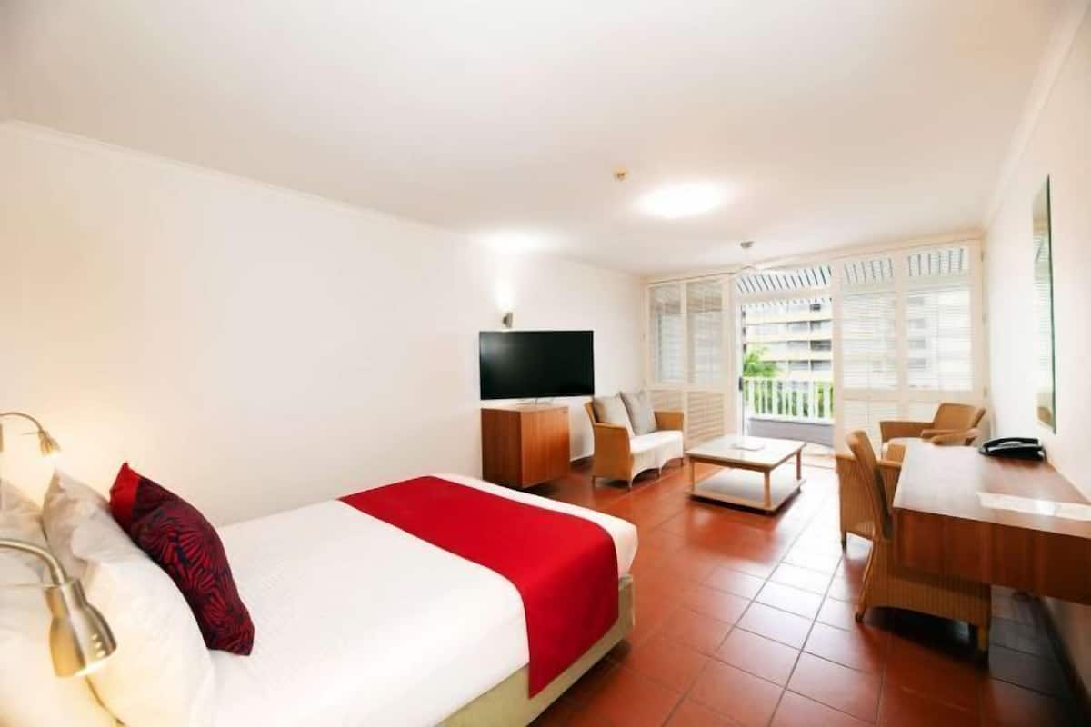 Premium bedding, desk, laptop workspace, soundproofing