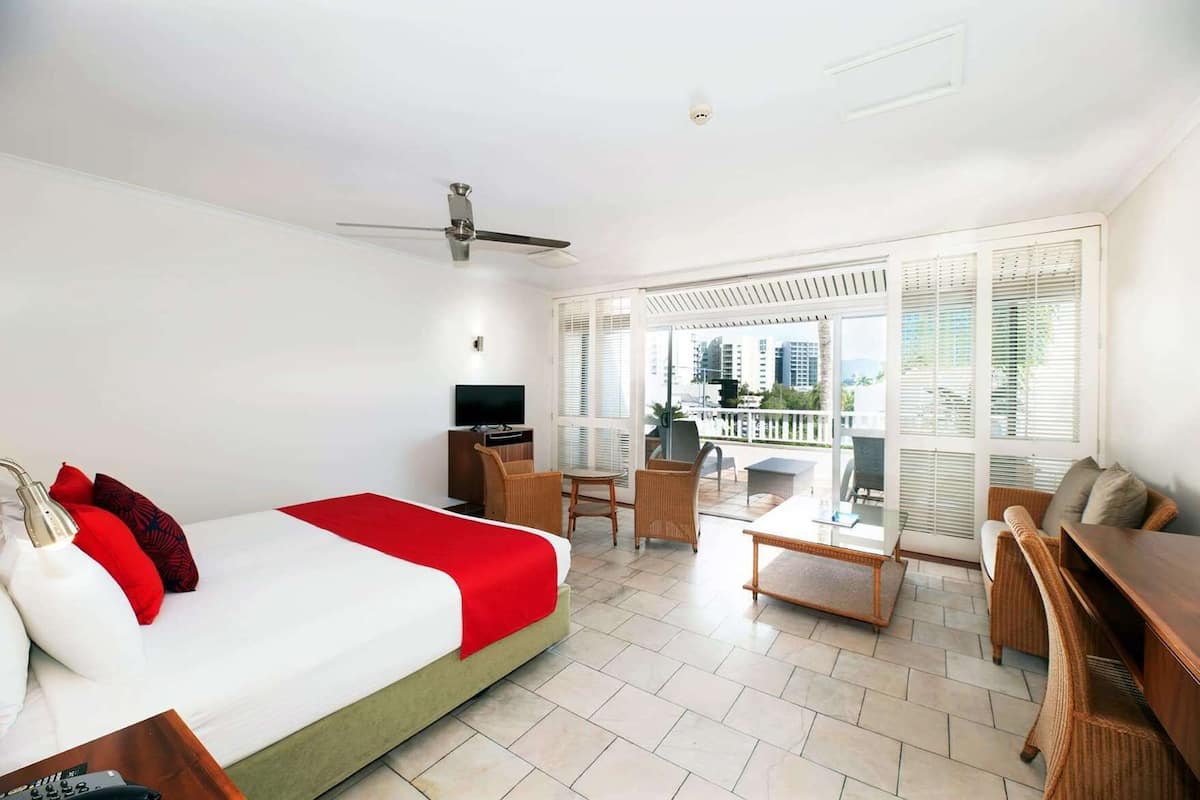Premium bedding, desk, laptop workspace, soundproofing